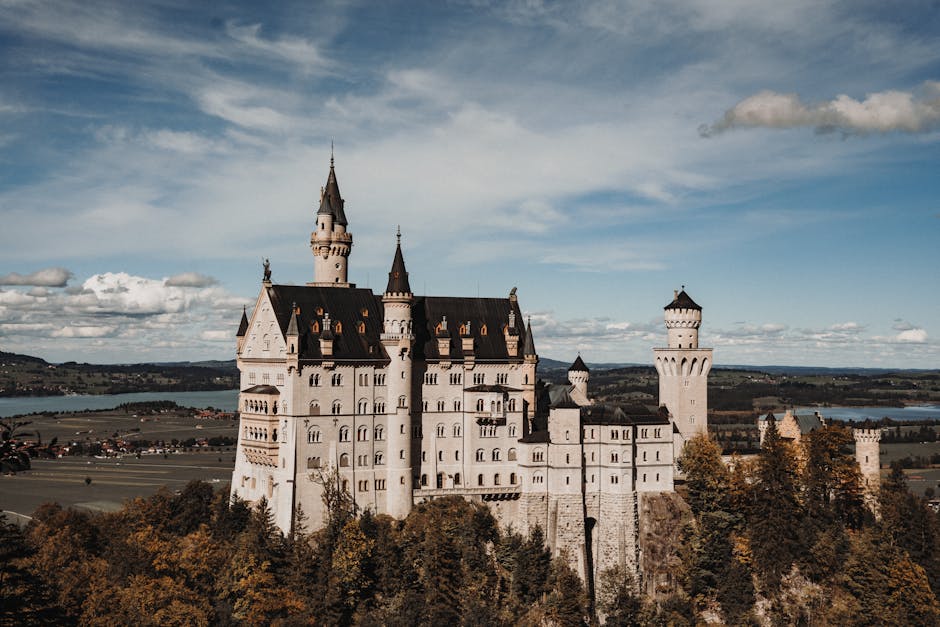 Stunning aerial view of Neuschwanstein Castle, a landmark in Bavaria, Germany.